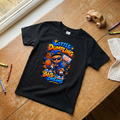 Little Dumpling Big Dreams Kids Graffiti Graphic Tee in black flat lay