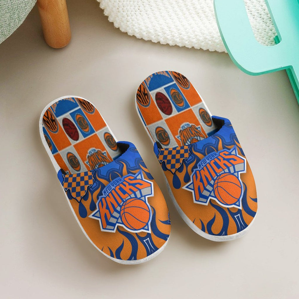 Royal blue and orange NY basketball fan slip-on slipper pair from above showing checkerboard footbed